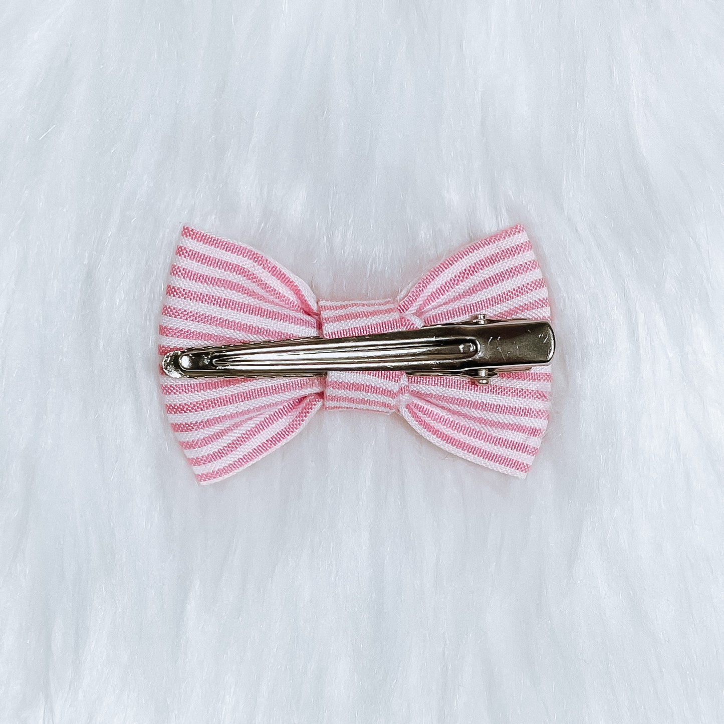 The “Bat sh*t crazy” pink Hair bow (bow tie style)