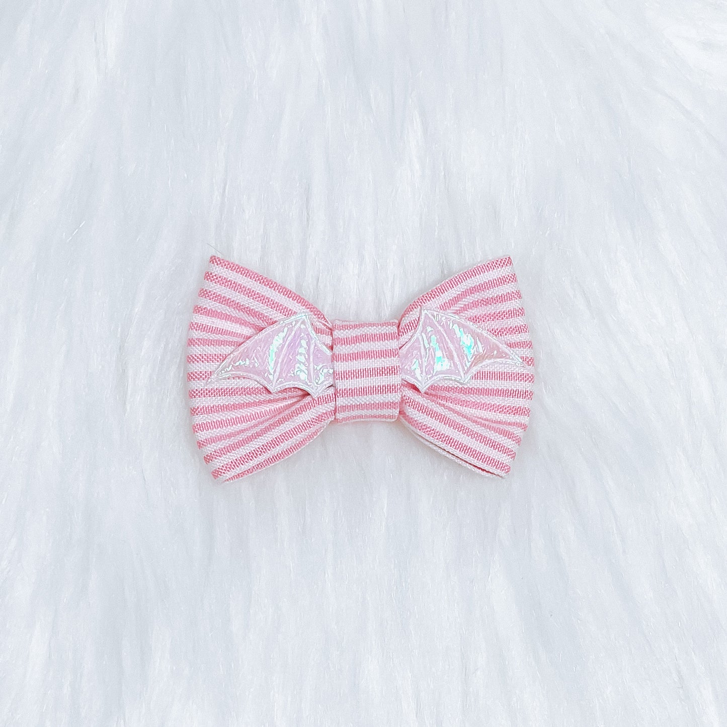 The “Bat sh*t crazy” pink Hair bow (bow tie style)